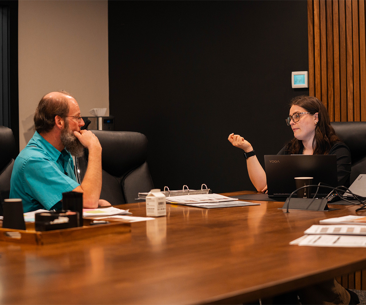 VIZTECH tech team helping a customer